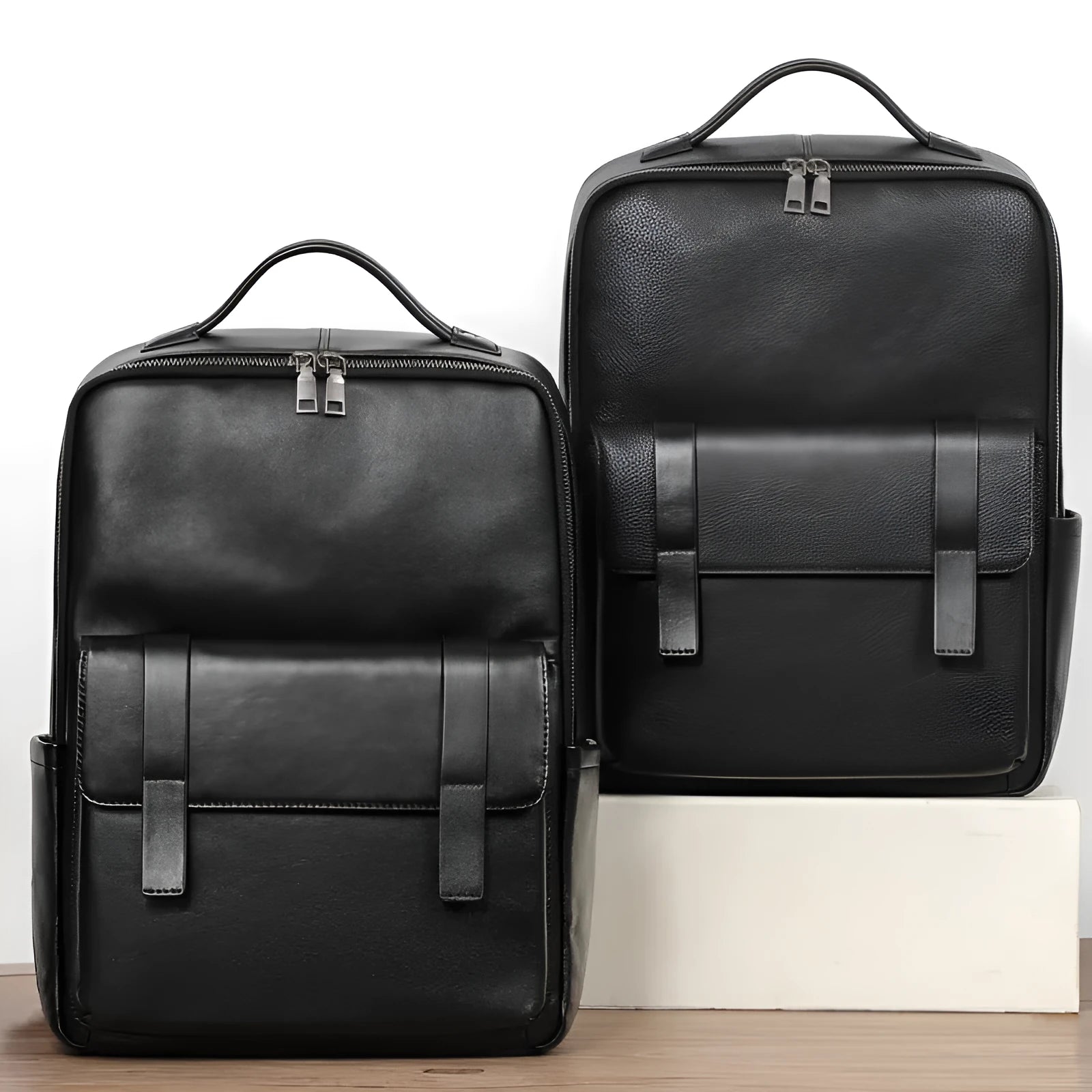 Men's black genuine leather laptop backpack with woven detail and large 36-55L capacity.