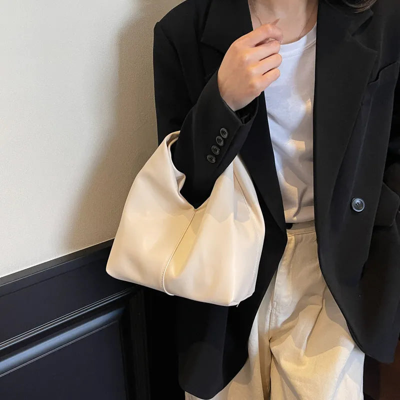 Idle Style Casual Cloud handbag in khaki showing front folding and stitching detail with sandwich pocket