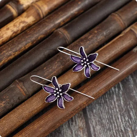 Purple flower-shaped alloy earrings with electroplated finish measuring 3cm in length