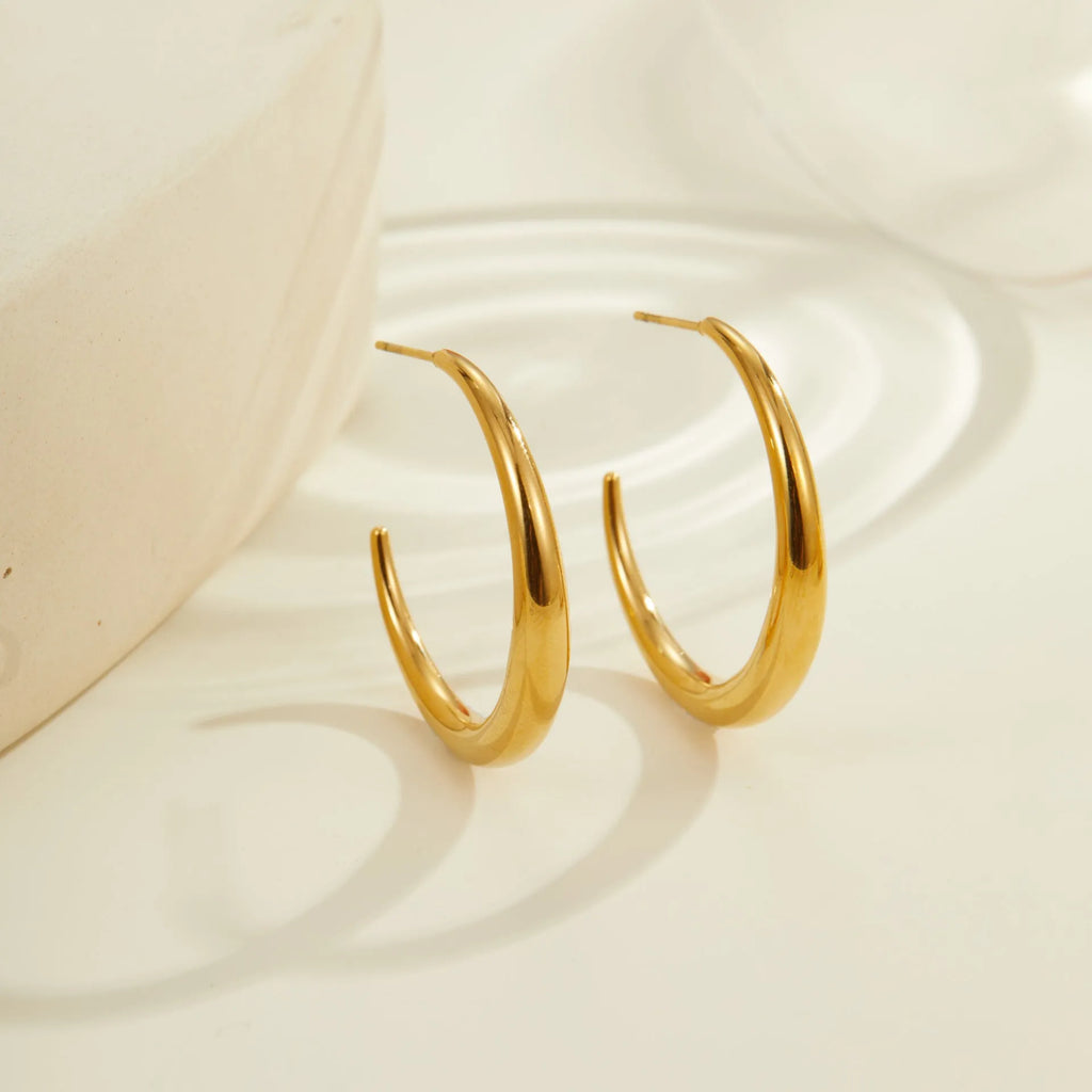 Geometric hoop earrings for women in stainless steel with gold or steel finish options