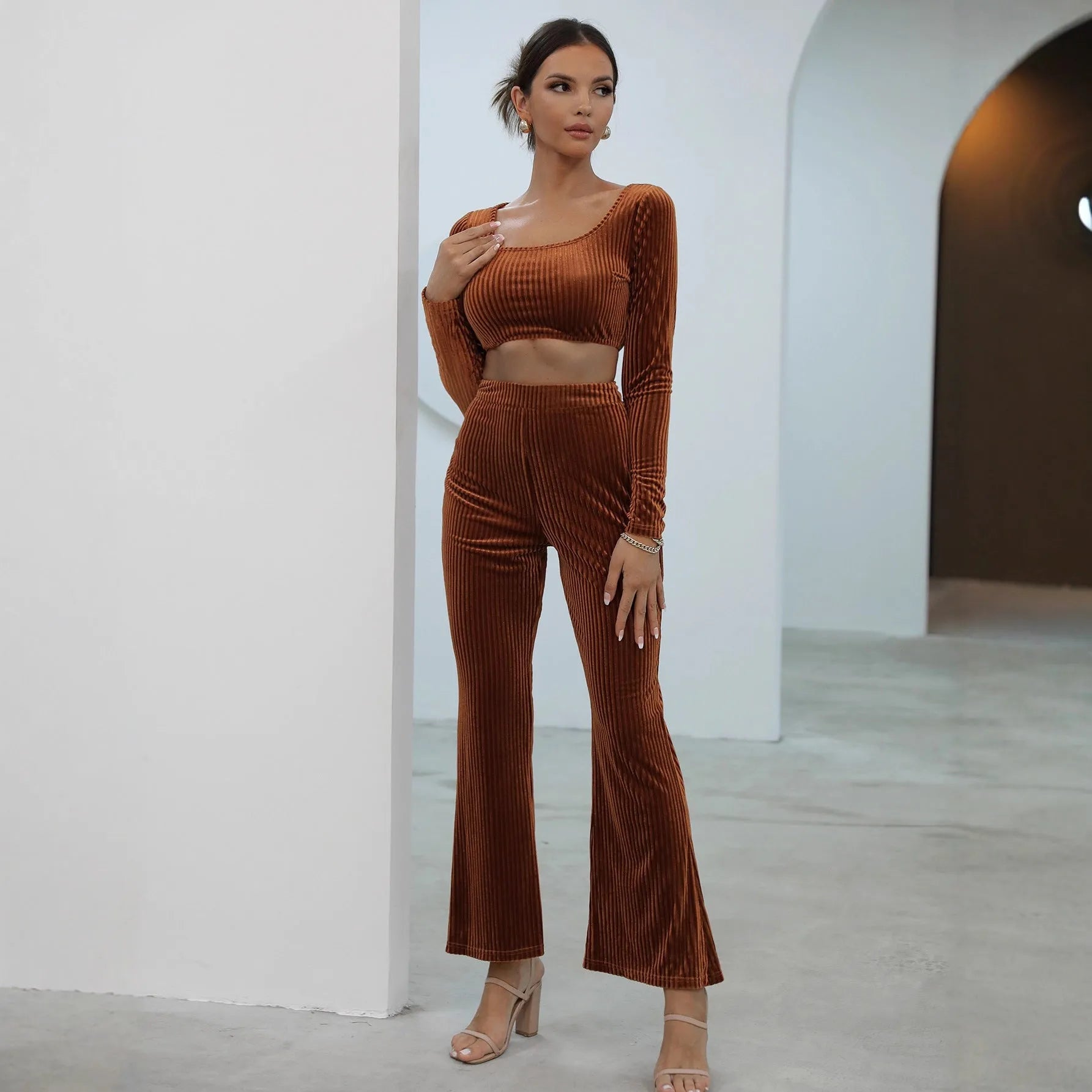 Caramel colour long sleeve sweater and trouser casual set laid flat