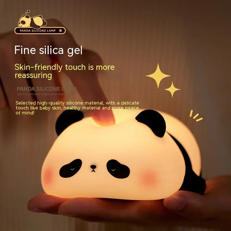 Cute panda-shaped night light made of BPA-free silicone on a bedside table