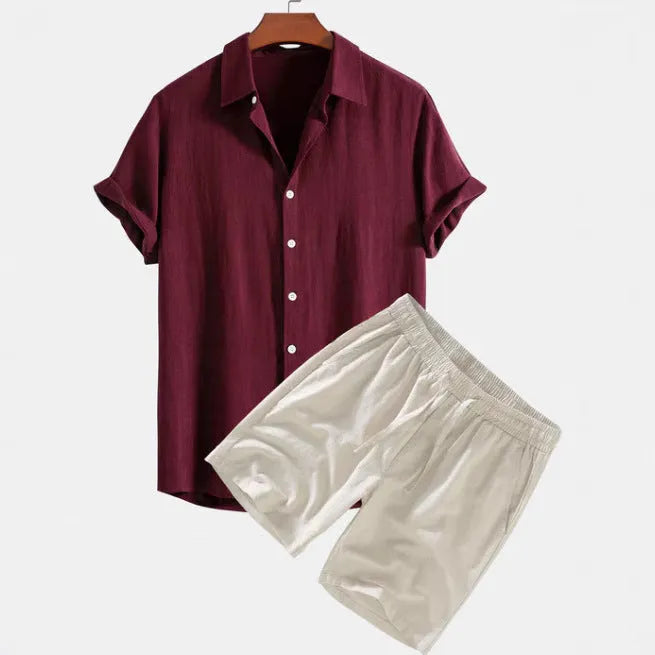 Men's solid colour casual short-sleeved shirt and shorts suit in polyester fibre, side view on model.
