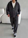 Women's loose-fit grey polyester coat and trousers two-piece set, street style.