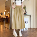Women's casual wide leg skirt in camel with elastic waist and quilting detail, cropped length