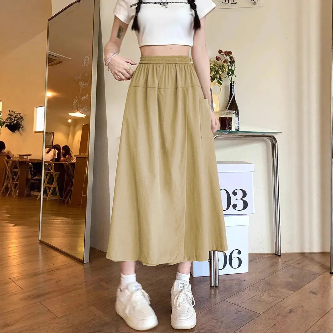 Women's casual wide leg skirt in camel with elastic waist and quilting detail, cropped length