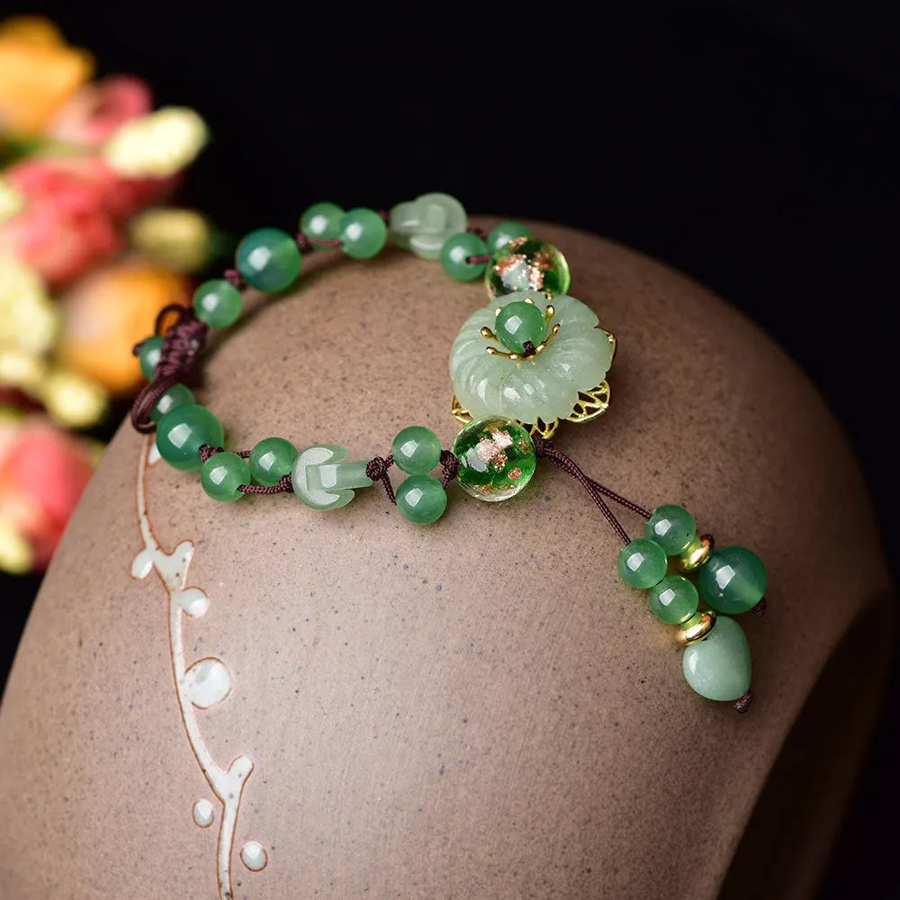 Women's Chinese style hand-woven bracelet in mixed materials with flower shape and auspicious patterns
