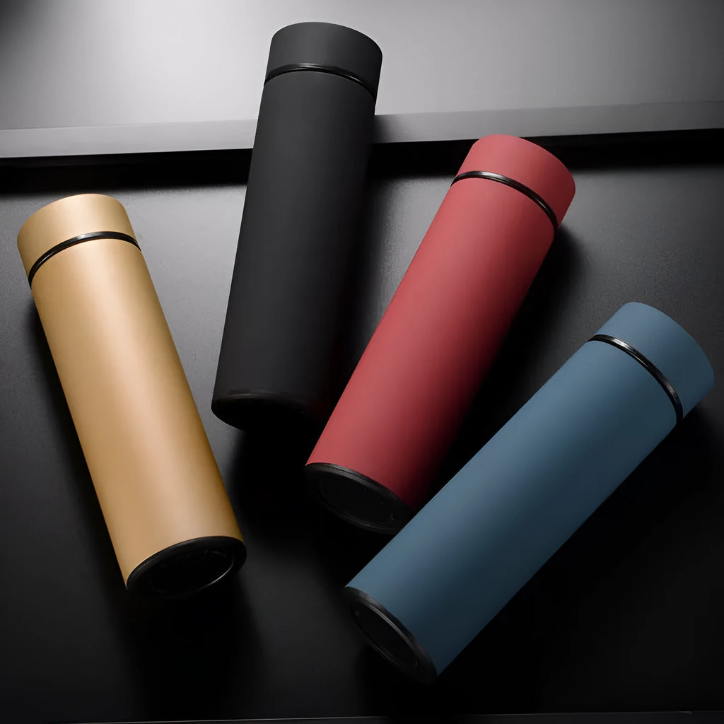 Stainless steel vacuum insulated water bottle in black, red, gold, or blue with 450ml capacity.