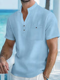 Men's loose fit linen blend short sleeve shirt with a stand collar in a light blue colour