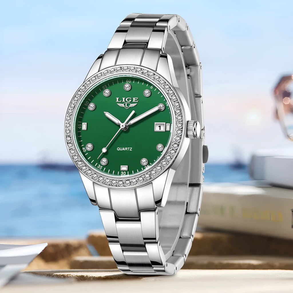 Women's silver tone quartz watch with diamond-encrusted bezel and luminous dial