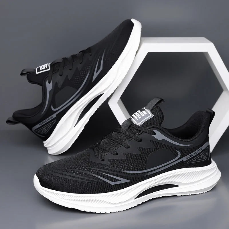 Men's low-top casual shoes in black with woven mesh upper and rubber sole.