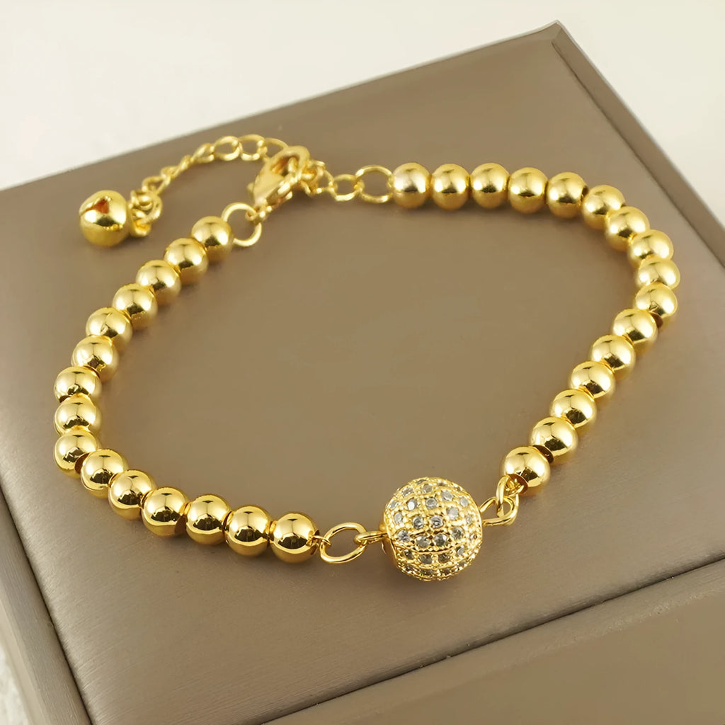 Women's electroplated copper bracelet with heart shape and round ball zircon in Arabic style design