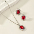 Alloy electroplated oval rhinestone earring and necklace set in blue display