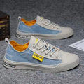 Men's canvas shoes in black, dark blue, and light blue with round toe and rubber sole