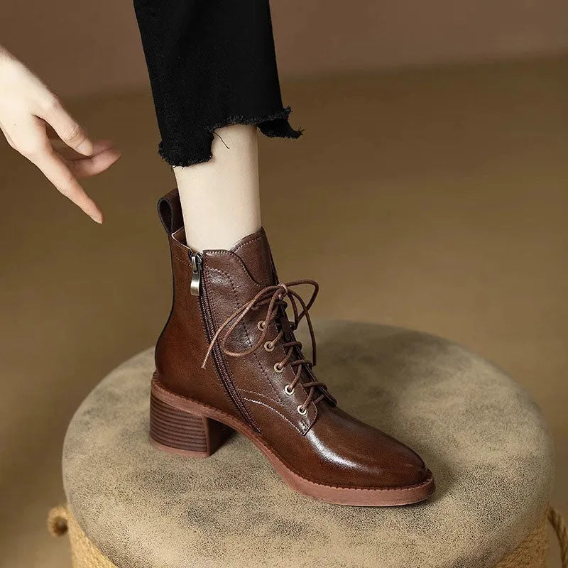Women's black pointed toe ankle boots with short tube design and block heel