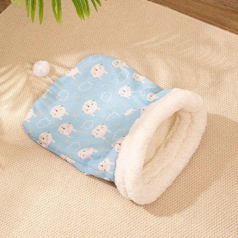 Blue rabbit design flannel cat sleeping bag nest measuring 50 by 40 centimetres.