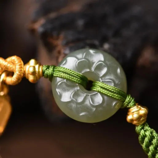 Hand-woven green rope bracelet with a Hetian jade safety buckle, adjustable sliding knot, women's National style accessory