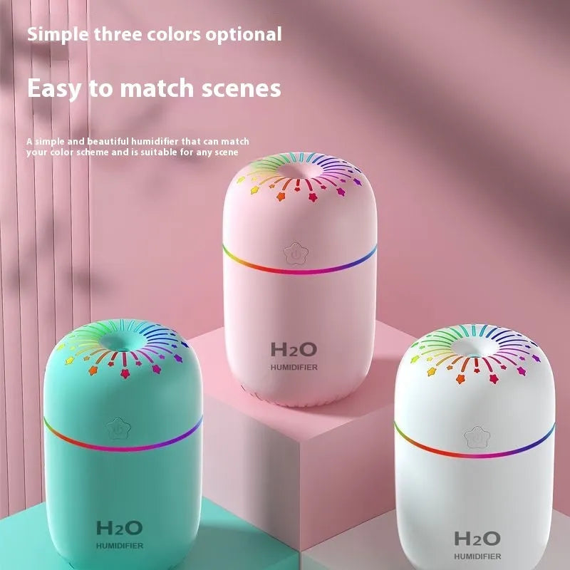 Small white USB desktop humidifier with fireworks design beside measurement showing 75mm width