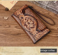 Chinese style embossed leather wallet in tri-fold design showing floral pattern on brown cowhide