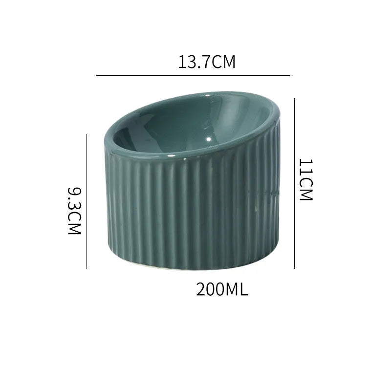 Ceramic elevated cat bowl in green colour with tilted whisker-friendly design for anti-vomit feeding height
