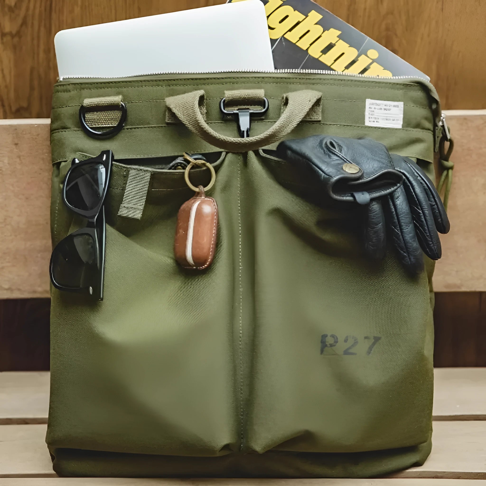 Marden Tooling retro canvas crossbody shoulder bag in military green or charcoal black showing internal phone compartment