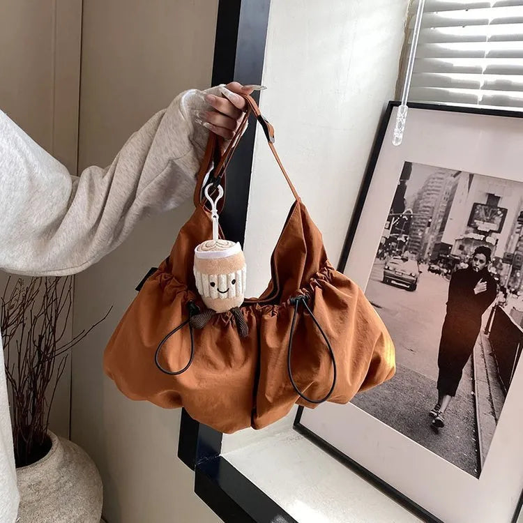 Ultra-light pleated crossbody student bag in polyester cloth with split pocket and mobile phone compartment