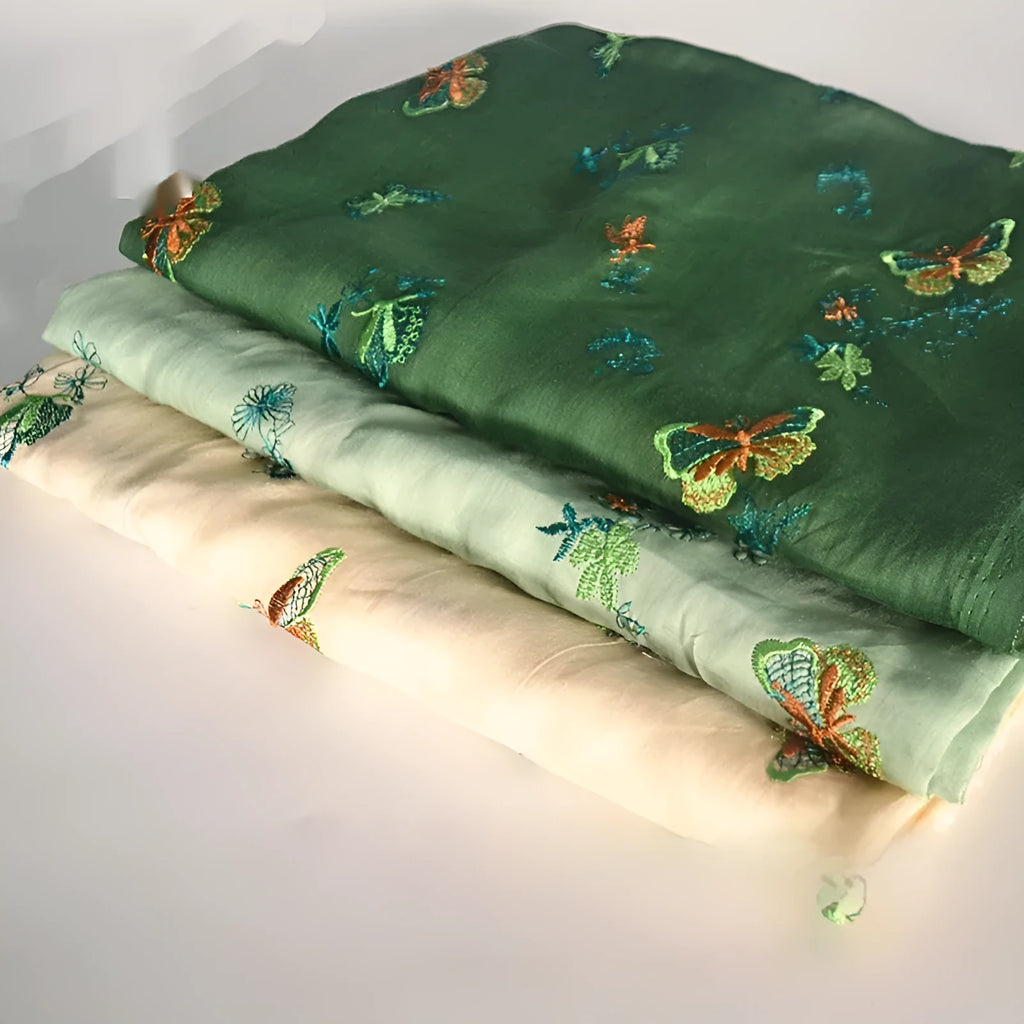 Pure ramie fabric for Hanfu making in beige, grass green, and dark green colours showing 140cm width