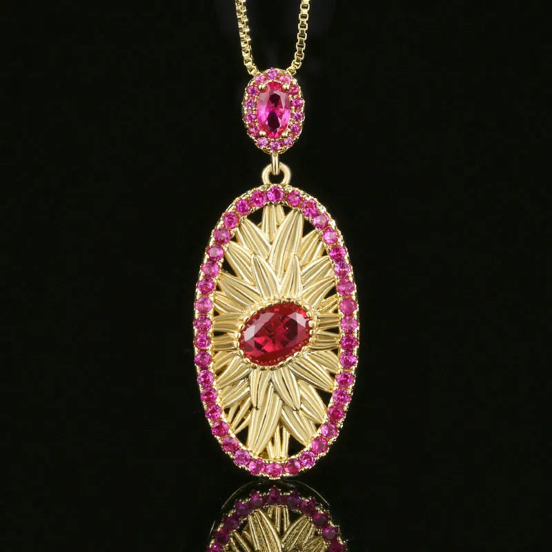 Gold-plated jewellery set with simulated red corundum stones, water drop shape, diamond cut finish, necklace ring ear studs