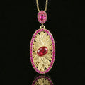 Gold-plated jewellery set with simulated red corundum stones, water drop shape, diamond cut finish, necklace ring ear studs