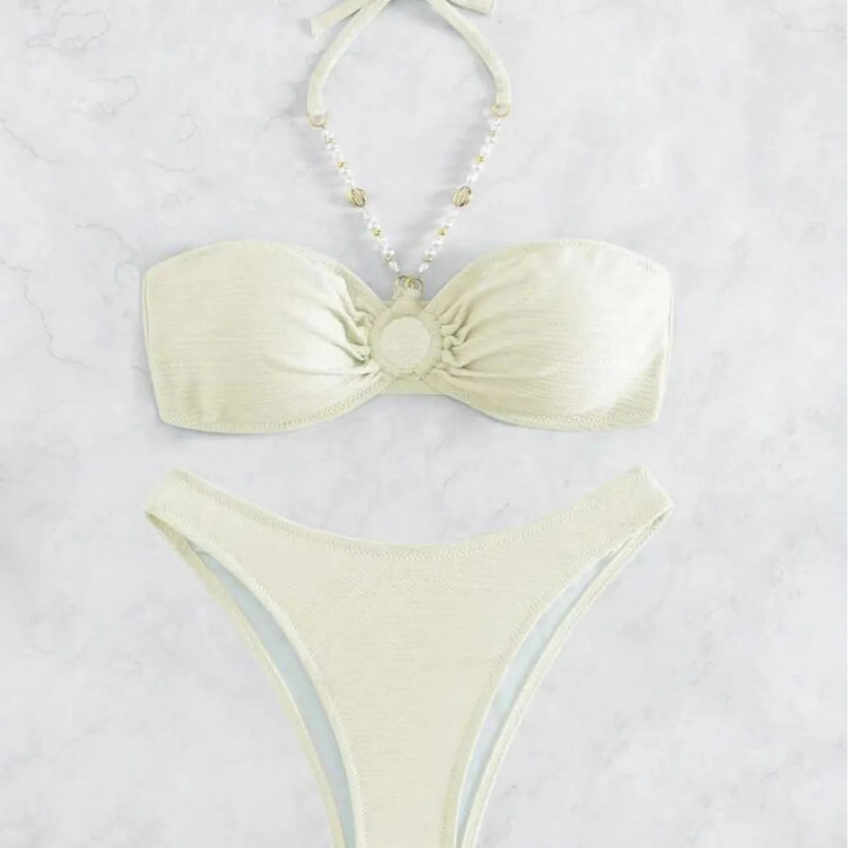 Solid colour halter women's bikini set in green, polyester fabric, available in sizes S, M, L Asian sizing