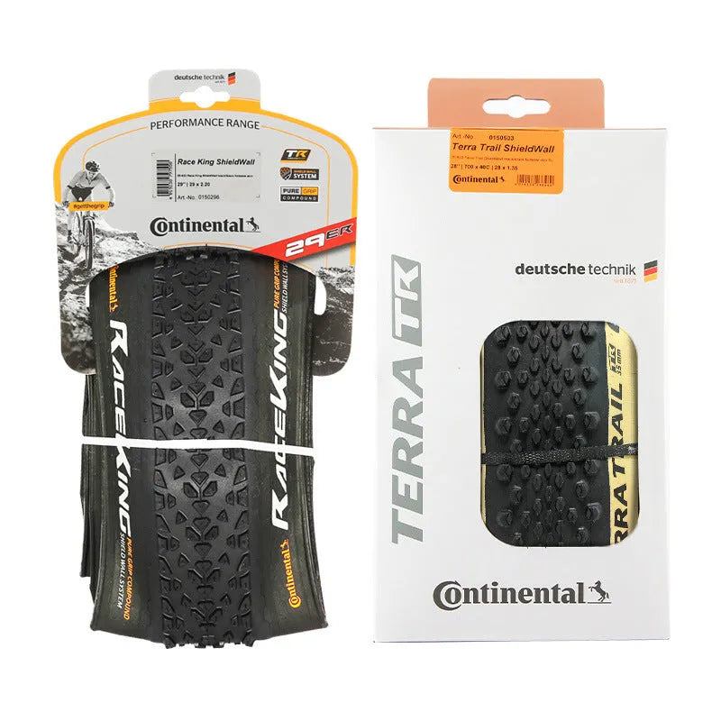 Mountain bike folding tyre showing tread pattern and sidewall with size specifications visible
