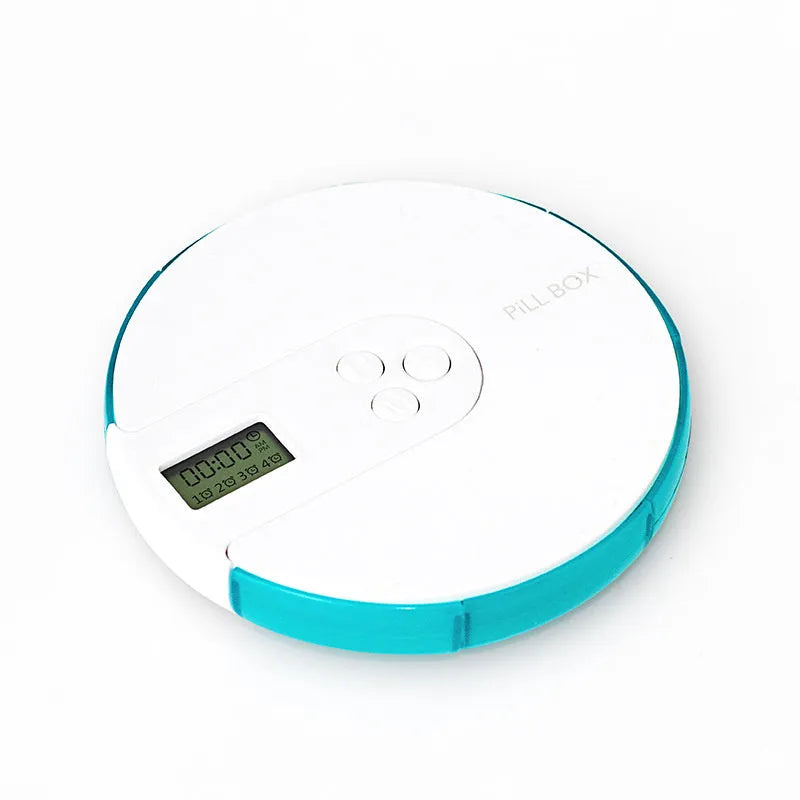 Seven compartment alarm clock pill dispenser showing medication compartments and display