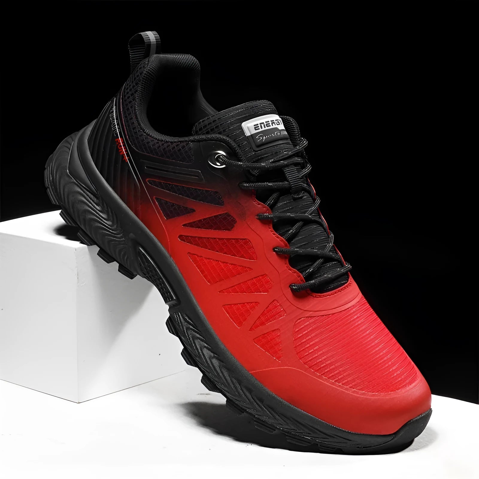Men's black and orange breathable mesh running shoes with lace-up front and rubber sole