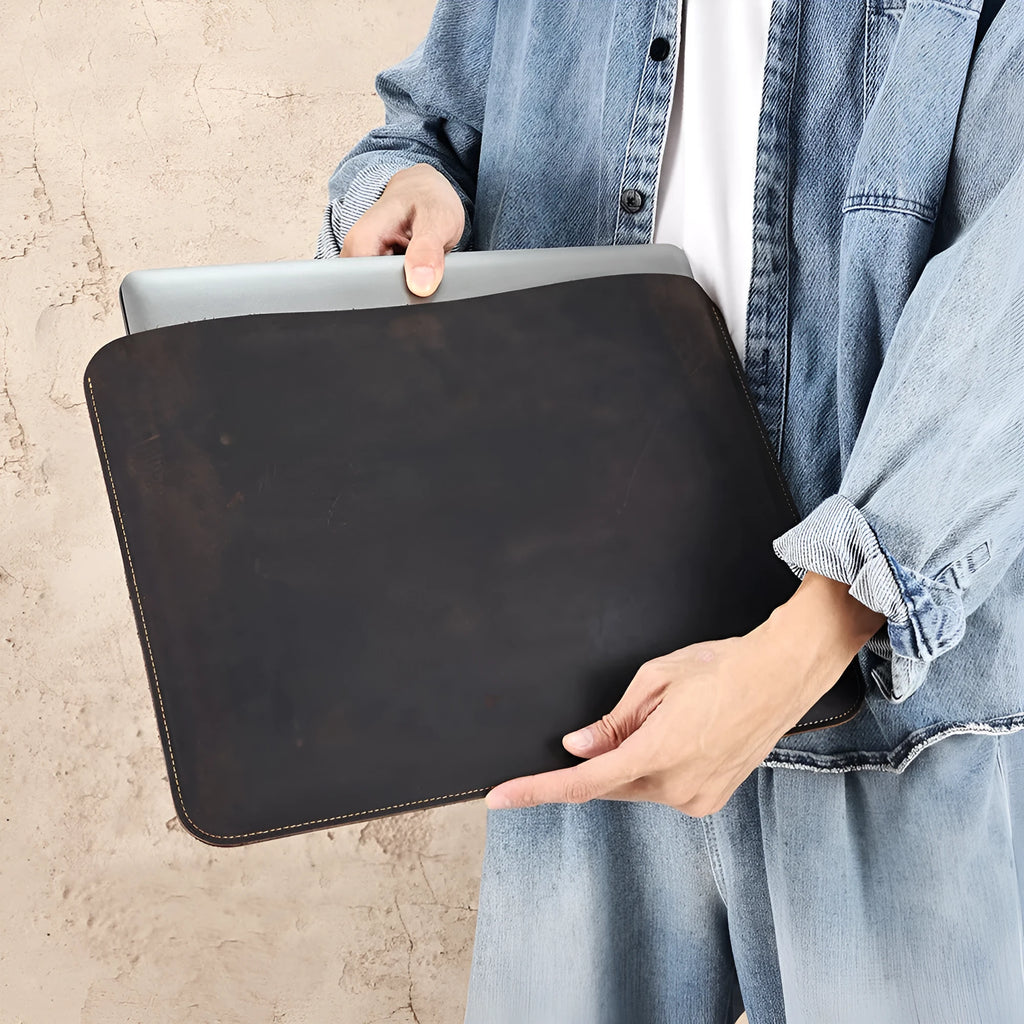 Men's brown Crazy Horse leather horizontal laptop liner bag showing first-layer cowhide texture