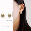 Geometric drop-shaped earrings with full diamond sparkle in gold or white colour for women