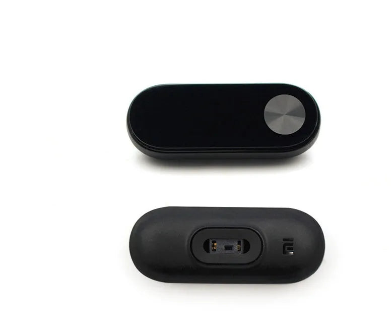 Xiaomi Mi Band 2 black smart fitness tracker with OLED touchscreen display on a wrist.