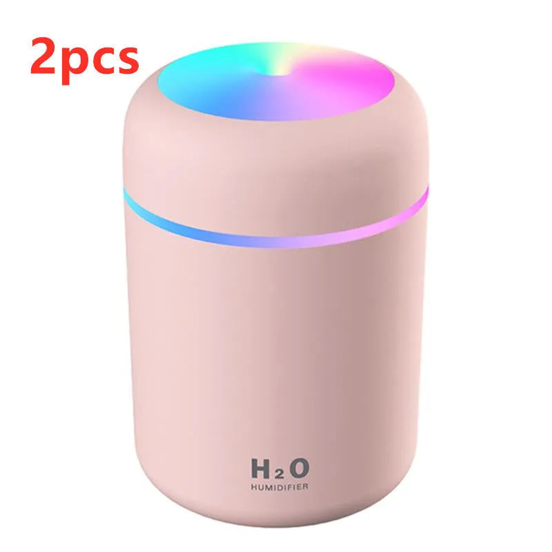Mini USB desktop humidifier in pink with 300ml tank, low noise, and colourful atmosphere lights