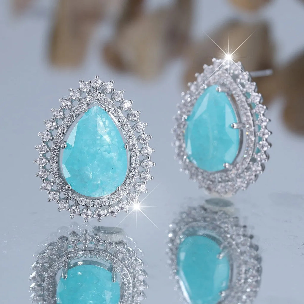 Pair of platinum ice flower diamond drop earrings with heart-shaped copper base