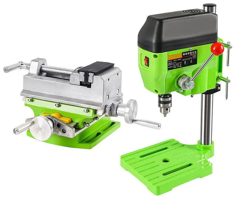 Bench drill and milling machine with cross bench pliers on workbench
