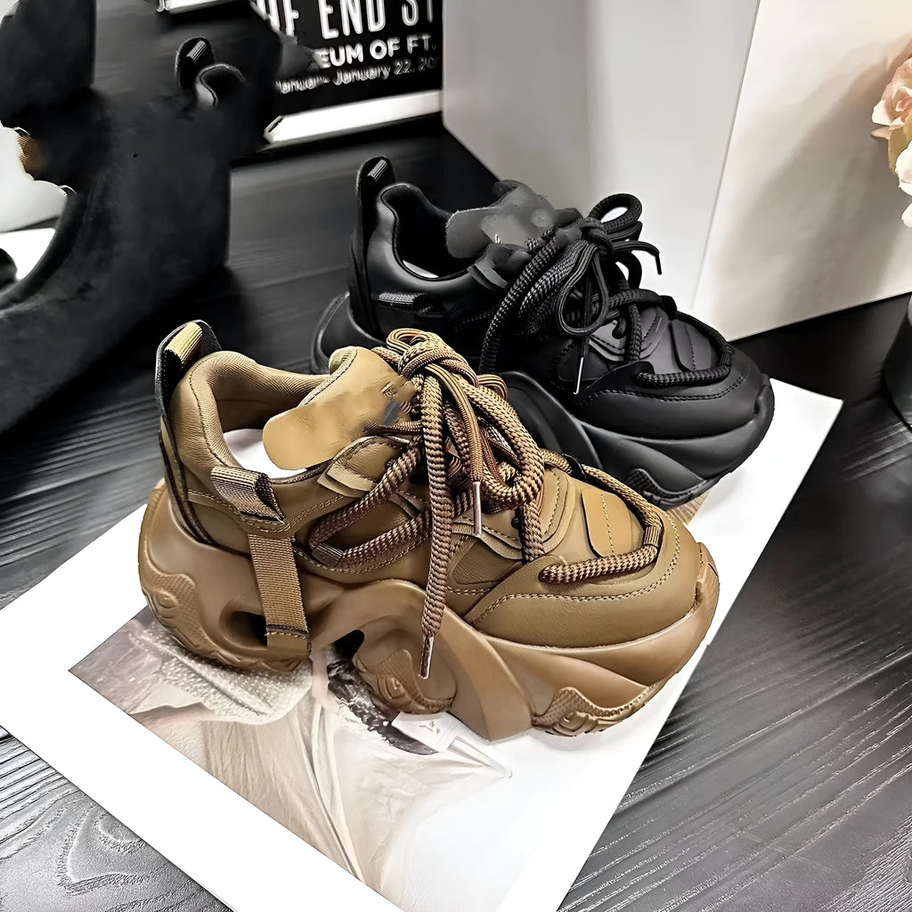 Women's casual sneakers with wedge heels in creamy white colour showing front lace-up closure and round toe