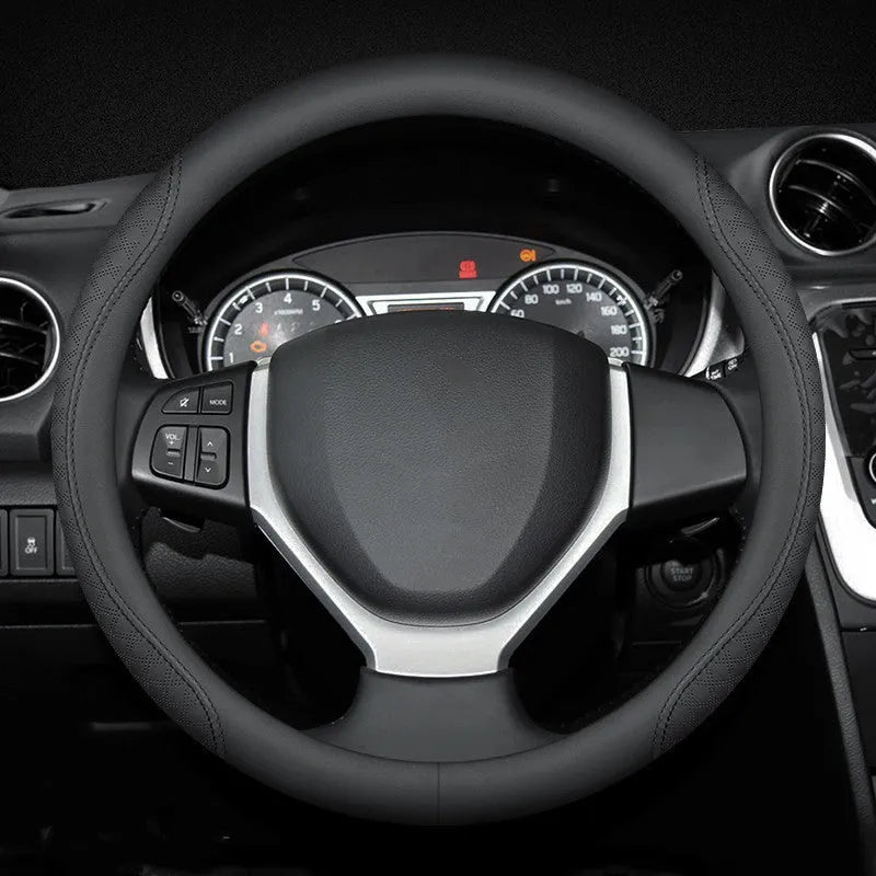 Black car steering wheel cover with two-colour line detail showing Napa leather texture and rubber inner ring