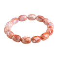 Natural cherry blossom agate bracelet with 10x14mm barrel beads and Ruyi geometric design elements