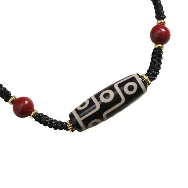 Men's shrinkable Tibetan agate dzi bead bracelet with original design, brown and white agate beads on wrist