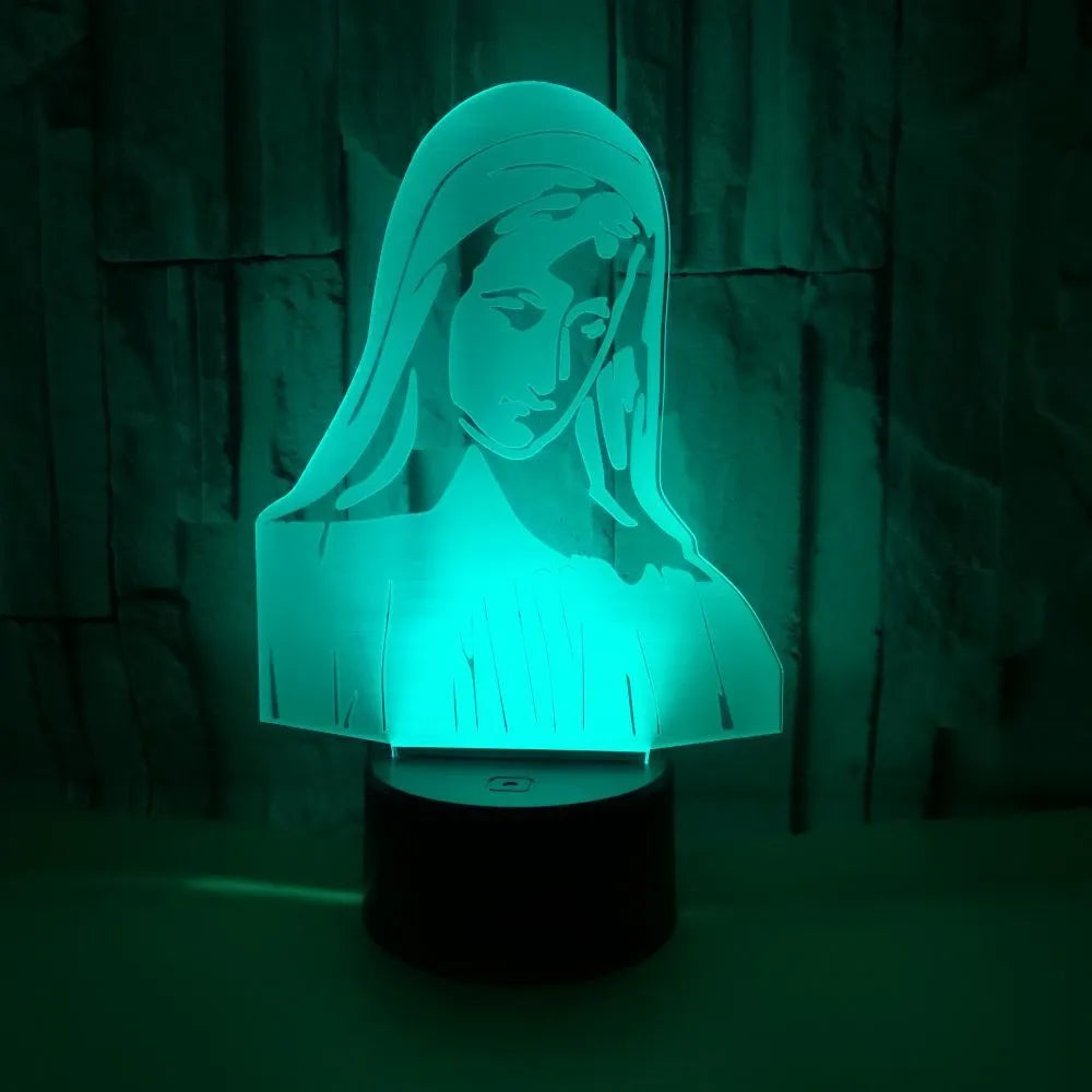 3D LED night light showing colourful dual ring pattern, with remote control and USB cable.