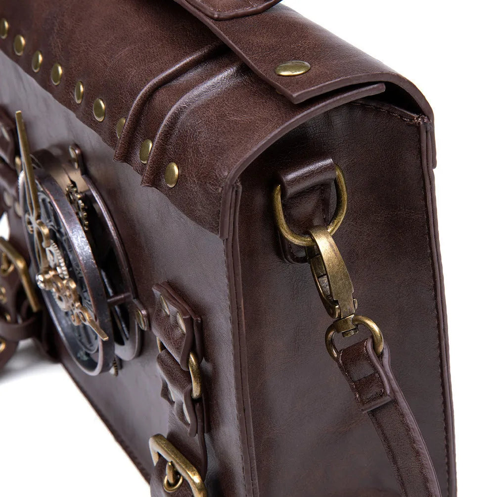Bronze steampunk industrial retro shoulder bag with metal hardware on horizontal pillow shape