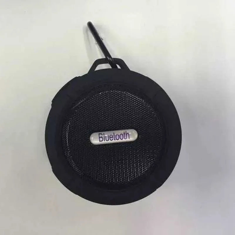 Portable waterproof Bluetooth stereo speaker in plastic housing with mountaineering buckle, available in multiple colours