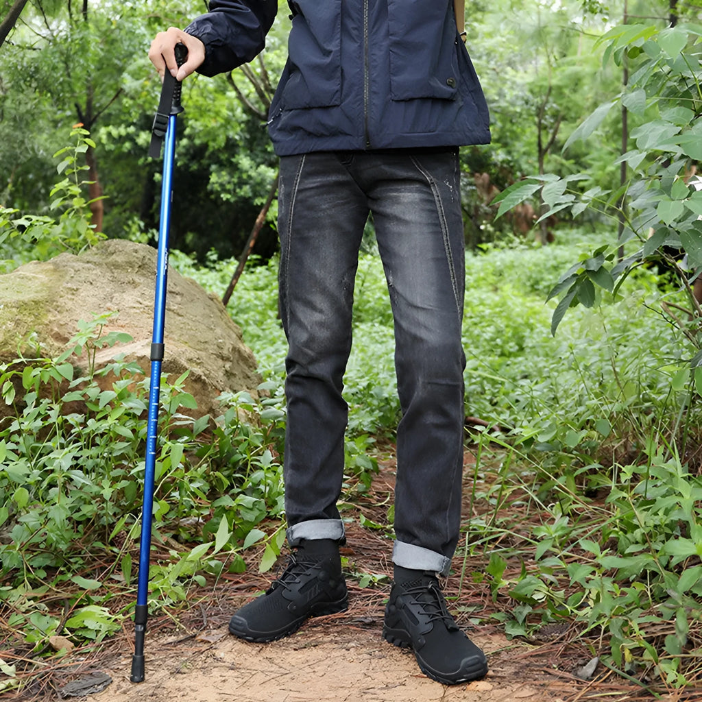Outdoor climbing boots with Flyknit upper and natural rubber sole, available in multiple colours and sizes
