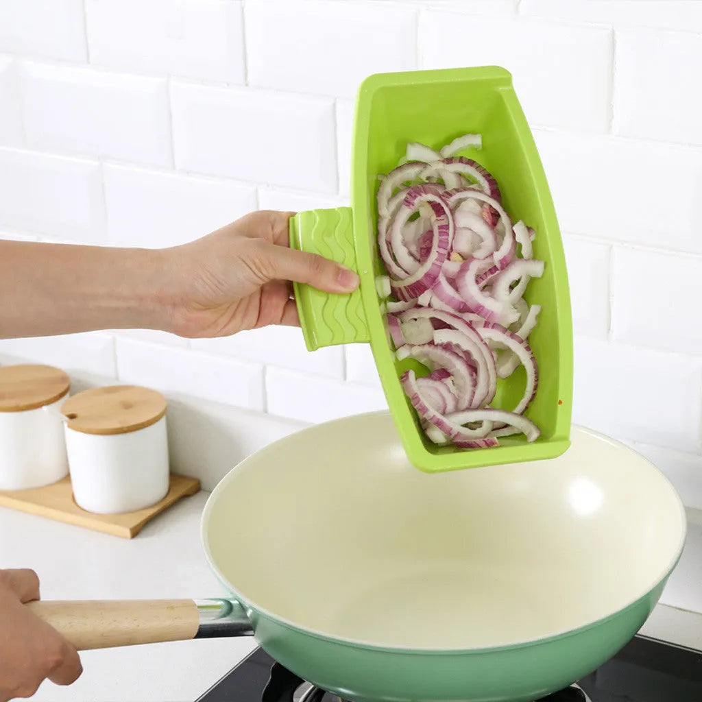 Green multi-function kitchen drain cutting board with storage trough and drainage holes on sink edge