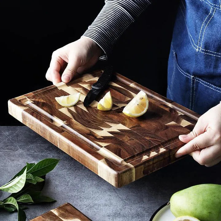 Brown parquet solid wood cutting board made from imported acacia, 3cm thick, on kitchen counter