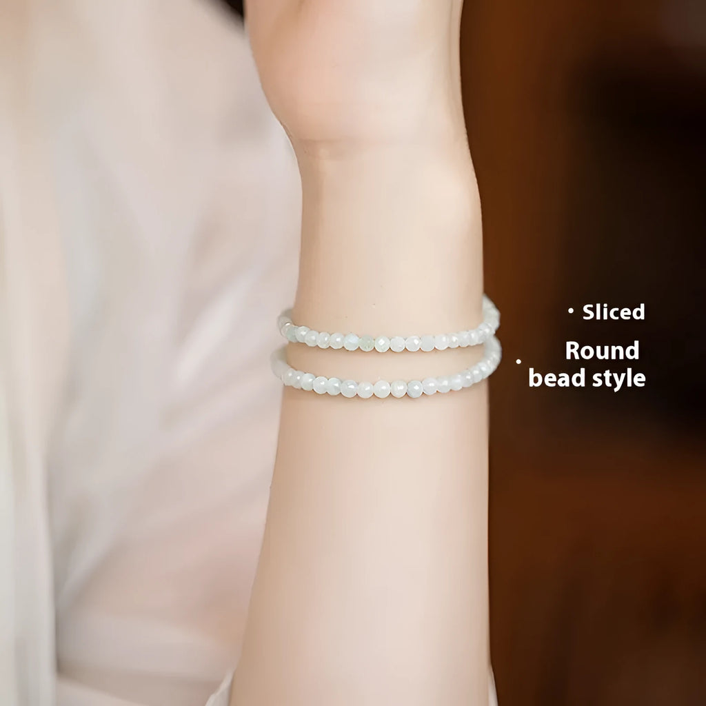 Women's Korean style retro bracelet with a jade ball charm on a chain.